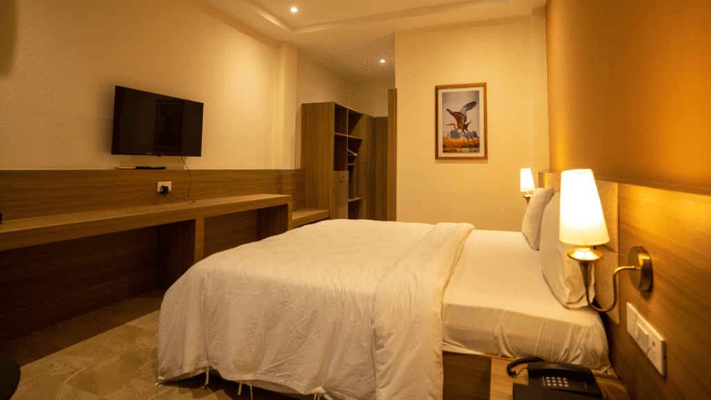 Deluxe room bed from Golden Pagoda ecoresort.png